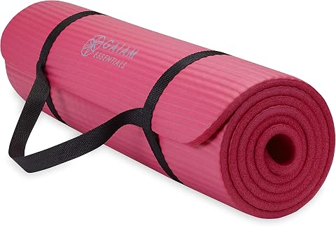 GAIAM Thick Exercise Mat, Cushioned Non-Slip Yoga & Pilates rolled in pink with a carrying sling for anti fatigue comfort during Floor exercises, matting, pilates, stretching, and Yoga.