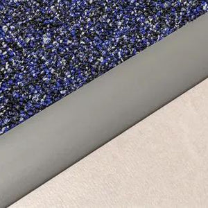 3/8" Vinyl Transition Strip Reducer, 3" Gradual Slope, 12' Black Heavy Duty installed between carpet and smooth flooring as a vinyl transition strip