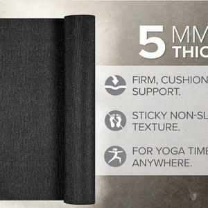Black yoga mat with text highlighting features on a gray background