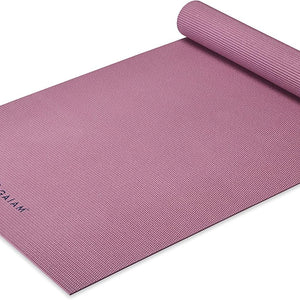 Gaiam Classic Solid Color Yoga Pilates Mat 5mm RoseyPink rolled angled view
