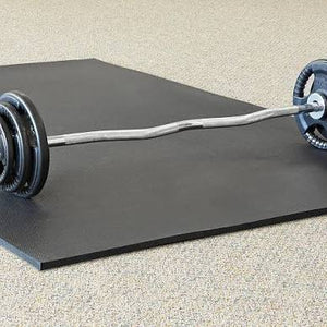 BullyMatts Trued rubber mat installed at gym equipment station showing floor coverage