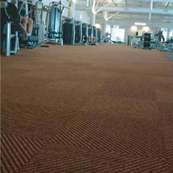 CarpeTile Sport interlocking carpet tile installed in office or gym showing full floor layout