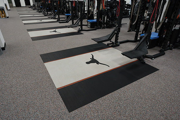 Galaxy Plus Rubber Gym Flooring Rolls - 48-Inch Wide, Recycled Rubber, Slip-Resistant, USA Made installed in a functional training facility with equipment lanes; rubber gym flooring rolls application